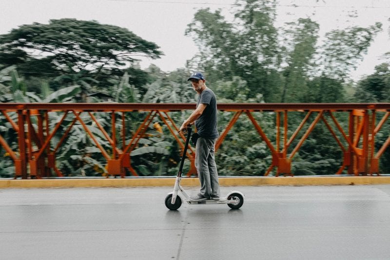 Man Riding Scooter Safely